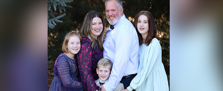 Melissa Jenovai, President/CEO pictured with her husband, Adam, and their three children