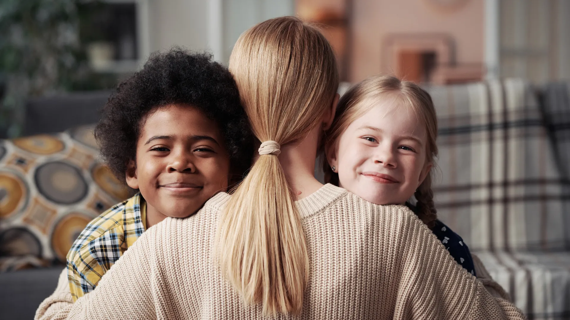 Creating Permanent, Loving Families for Every Child Adoptive mother hugging