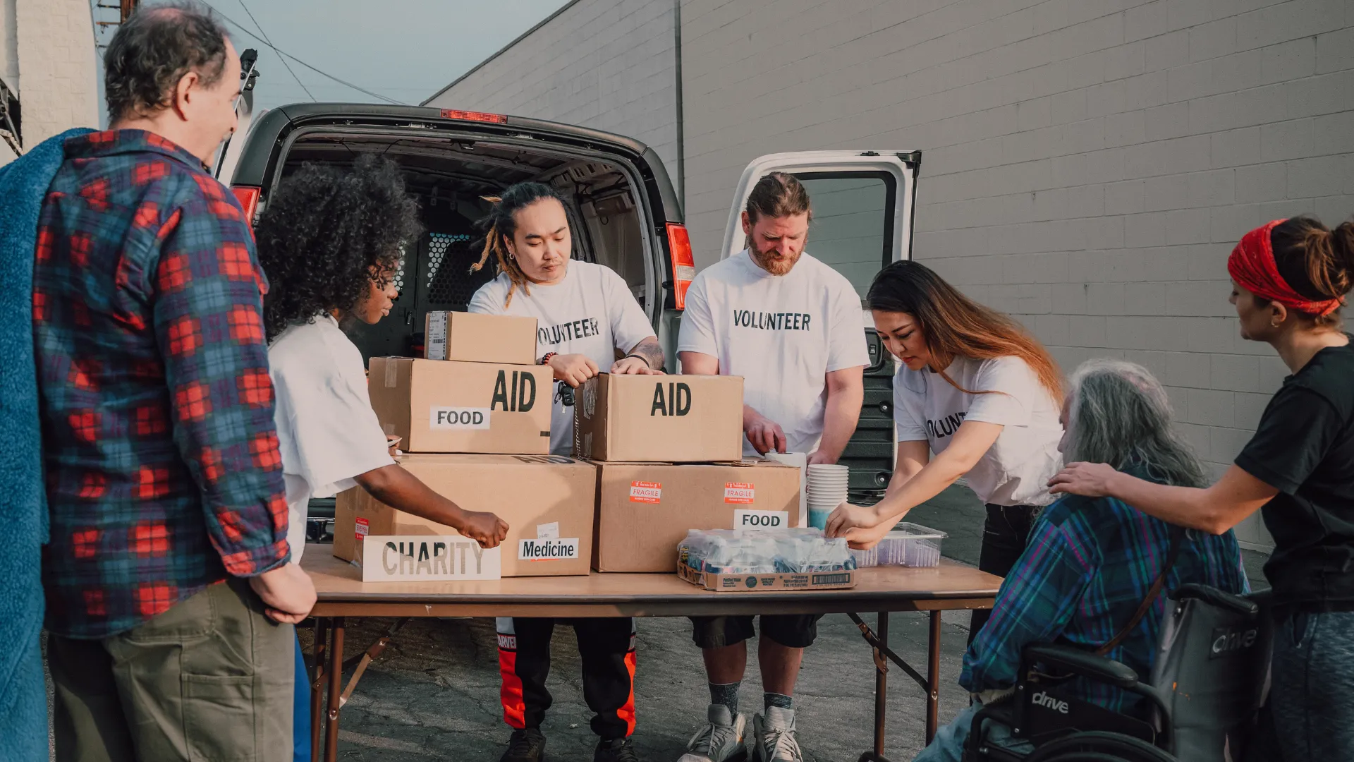 A few members passing out donated supplies.