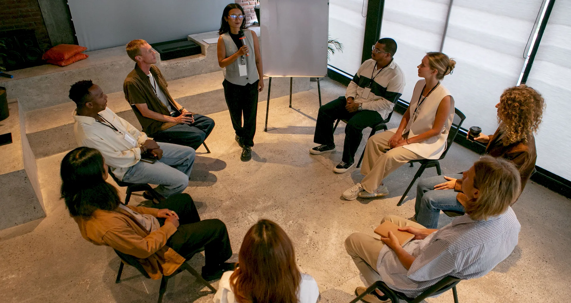 A woman instructor leading a training for service providers.